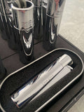 Close up of a chrome clipper lighter  with 'Happy Birthday Grandad' engraved on  